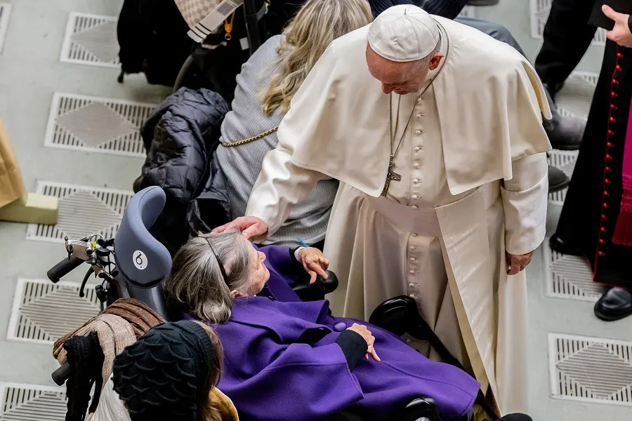 Pope Francis greets an elderly woman during his general audience Dec. 19, 2018.?w=200&h=150